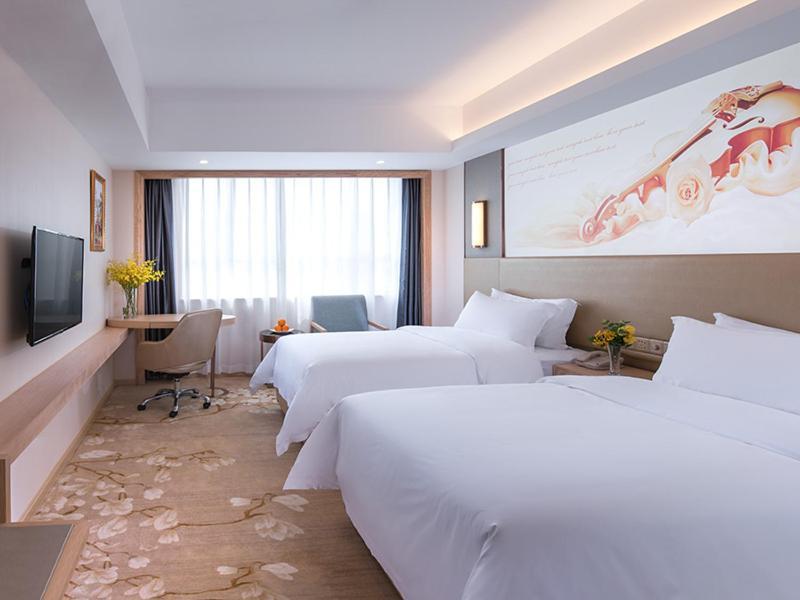 Vienna Hotel Shenzhen Pingji Ave Exterior photo